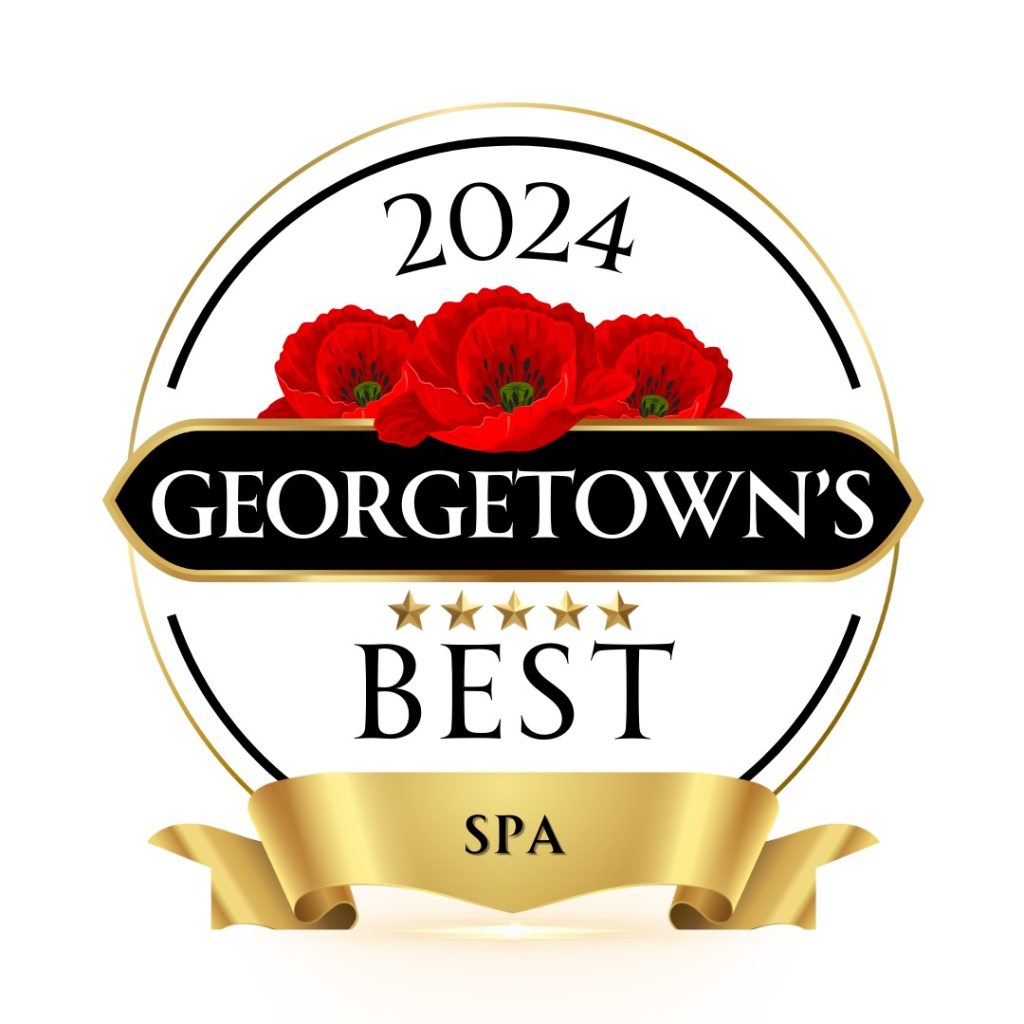 Circular emblem reading "2024 Georgetown's Best Spa" with red flowers at the top and five gold stars beneath. A gold ribbon decorates the bottom of the design.